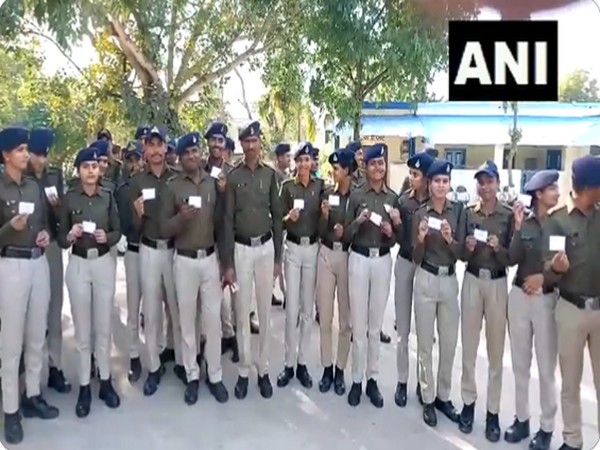 Newly inducted police constables with their slips. (Photo/ANI)