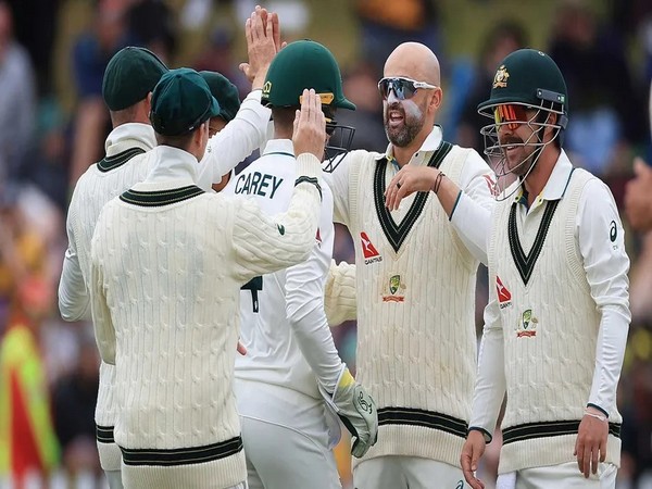 Nathan Lyon celebrating with teammates (Photo: cricket.com.au)