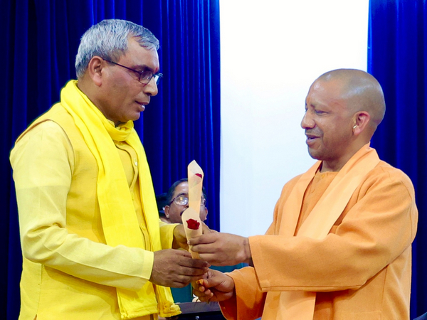 Uttar Pradesh Chief Minister Yogi Adityanath with SBSP chief OP Rajbhar (File Photo/ANI)