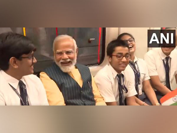 Prime Minister Narendra Modi travels with school students in India's first underwater metro train in Kolkata (Photo/ANI)