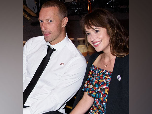 Chris Martin and Dakota Johnson (Image source: X)