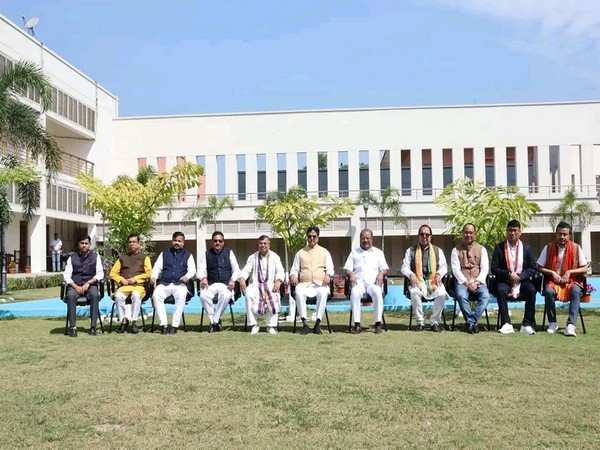 Tripura CM Manik Saha with newly joined MLAs of TIPRA Motha. (Photo/ANI)