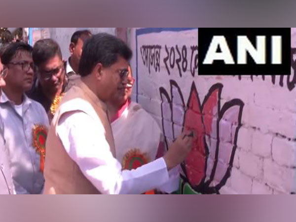 Tripura CM Manik Saha participates in the party's Lok Sabha poll campaign 'wall writing' programme in Malda, West Bengal. (Photo/ANI)