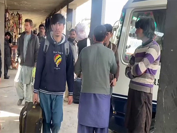 Travellers remain stuck at bus stops (Photo/ANI)