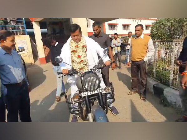 Sukanta Majumdar campaigning at Balurghat on motorcycle (Photo/ANI)
