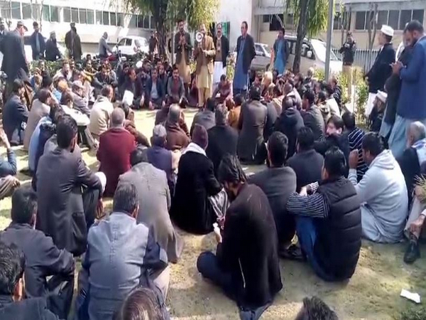Secretariat employees association holds rally in Muzaffarabad. (Photo: ANI)