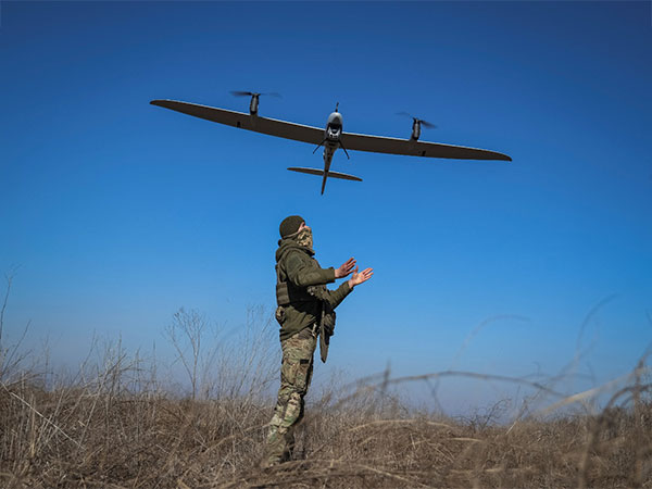 A Ukrainian serviceman launches a mid-range reconnaissance drone type Vector (Photo/Reuters)