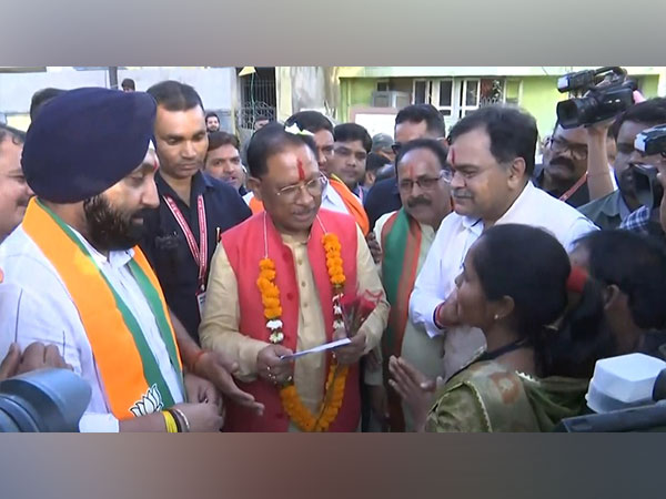 Chhattisgarh Chief Minister Vishnu Deo Sai interacts with localites in Raipur (Photo/ANI)