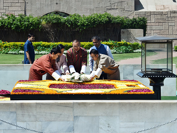 Bhutan Prime Minister, Tshering Tobgay pays his respects to Mahatma Gandhi at Rajghat, New Delhi on Friday (Photo/X@MEAIndia)