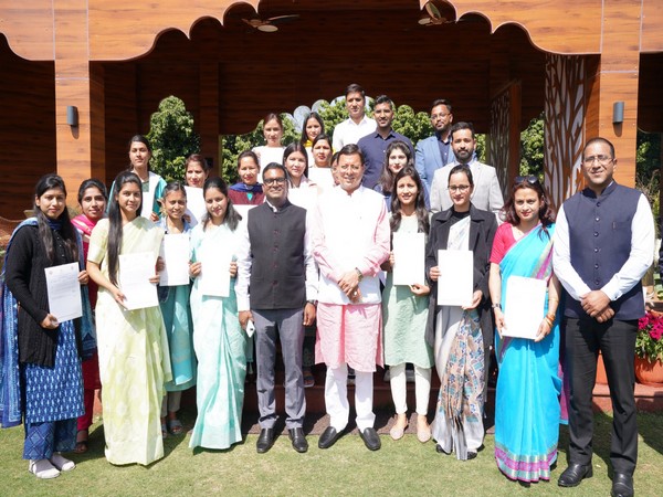 Uttarakhand Chief Minister Pushkar Singh Dhami with the candidates. (Photo/ANI)