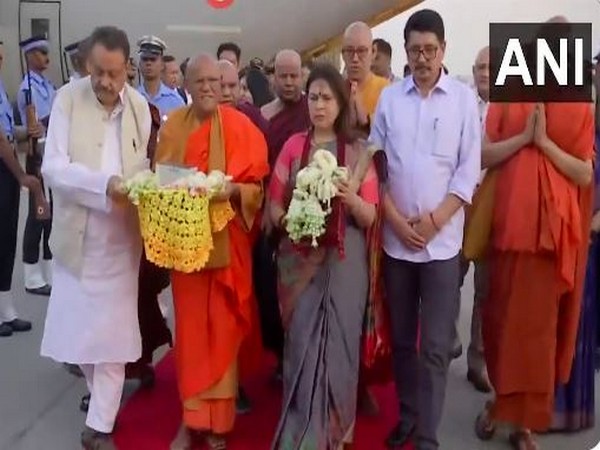 Union Minister Meenakashi Lekhi carrying holy relics of Lord Buddha after it returns to India (Photo/ANI)  