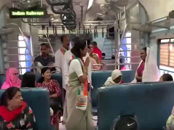 NCP leader Supriya Sule travels in train (Photo/ANI)
