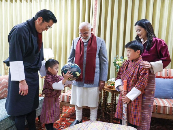 PM Modi with family of Bhutanese King (Photo/ANI)