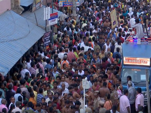 Devotees take part in car festival at Sri Subramaniyaswamy Temple in Madurai (Photo/ANI) 