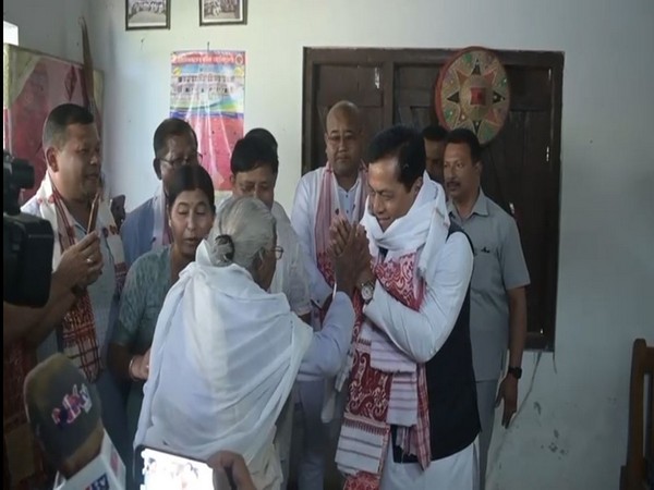 BJP's Dibrugarh LS candidate Sarbananda Sonowal visits Madarkhat Xatra (Photo/ANI)