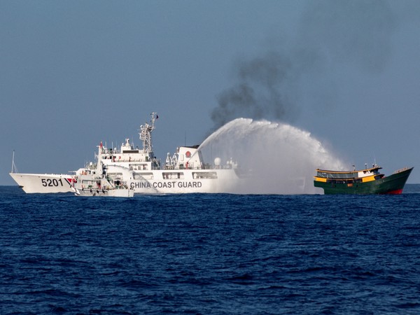 Chinese Coast Guard vessels fire water cannons towards a Philippine resupply vessel Unaizah May 4 on its way to a resupply mission at Second Thomas Shoal in the South China Sea (Photo/Reuters)
