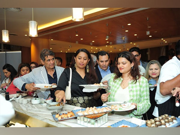 Guests enjoying the authentic Japanese food at the Soiree