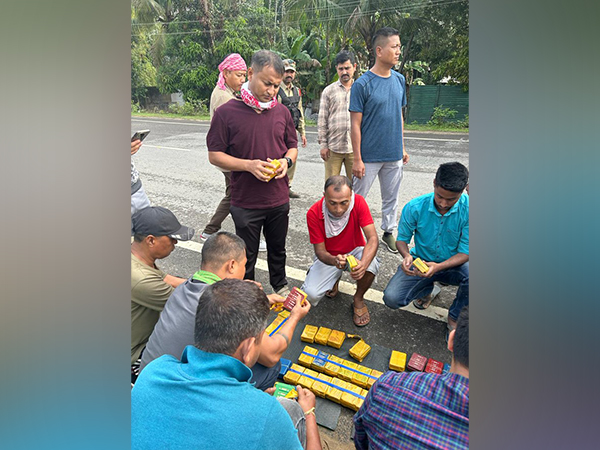 Officials with seized drugs (Photo:X/@himantabiswa)