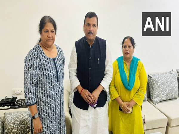 AAP MP Sanjay Singh met Satyendra Jain's wife. (Photo/ANI)