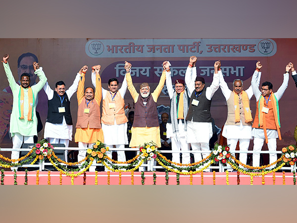 Prime Minister Narendra Modi with Chief Minister Pushkar Singh Dhami. (File photo/ANI)
