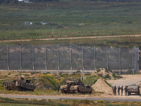 Israeli military vehicles hold position near the Israel-Gaza border (Photo/Reuters)