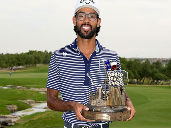 Akshay Bhatia lifting Valero Texas Open trophy (Image: PGA)