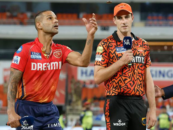 Shikhar Dhawan and Pat Cummins. (Photo- IPL)