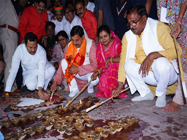 Madhya Pradesh CM Mohan Yadav lighting lamps (Photo/ANI)