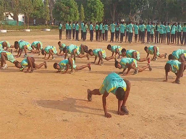 Youths attend training session at Balrampur police parade ground. (Image/ANI)