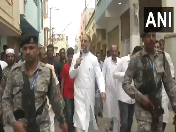 AIMIM chief Asaduddin Owasi holds door-to-door campaign in Hyderabad (Image/ANI)