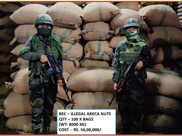The team of Assam Rifles with the bags of areca nuts (Photo/ANI)