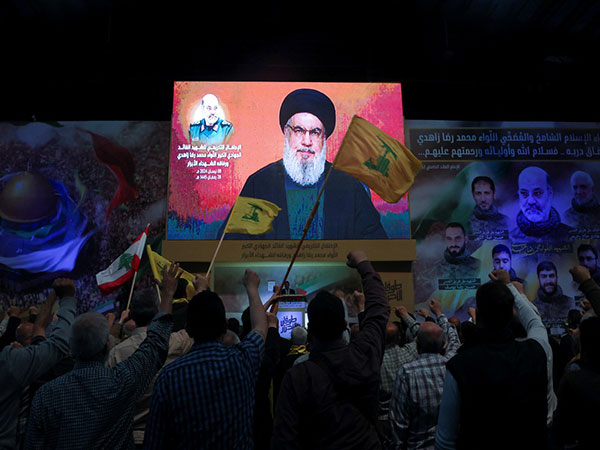 Lebanon's Hezbollah leader Sayyed Hassan Nasrallah gives a televised address in Beirut's southern suburbs (File Photo/Reuters)
