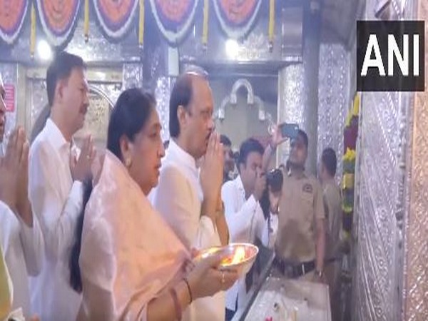 Ajit Pawar and Sunetra Pawar at Shreemant Dagdusheth Halwai Ganpati temple in Pune. (Photo/ANI)