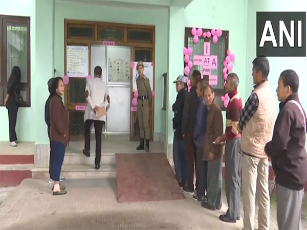 People queue up outside a polling station in Soreng, Sikkim (Photo/ANI)