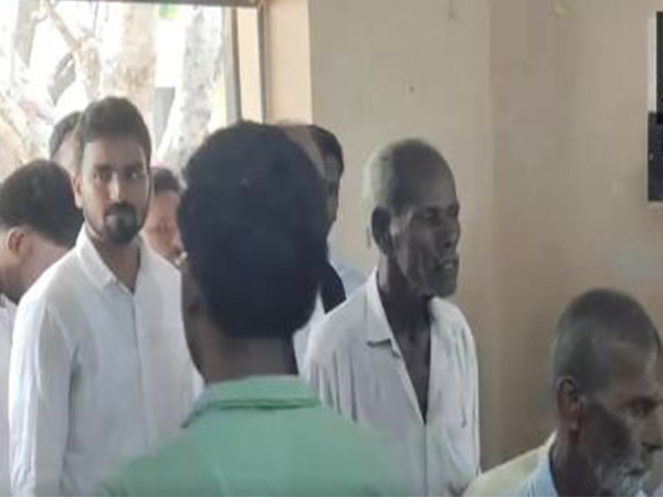 Voters Stand in a queue as they wait for their turn to cast their vote inTenkasi, Tamil Nadu  Photo/ANI)