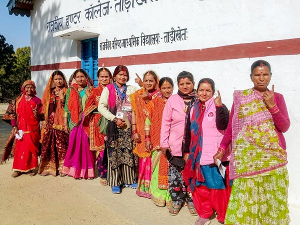 Voters show their ink-marked fingers after casting their vote in Nainital (Photo/ANI)