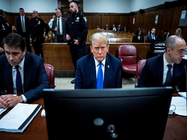 Former US President Donald Trump along with his legal team at Manhattan criminal court (Image Credit: Reuters)