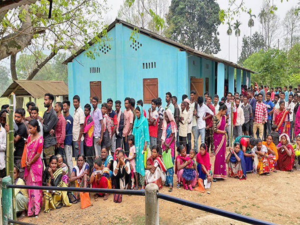 Voters at a polling booth in Assam on Friday. (Photo/ANI)