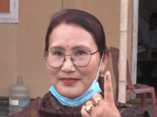 Voter shows inked finger after casting her vote. (Photo/ANI)