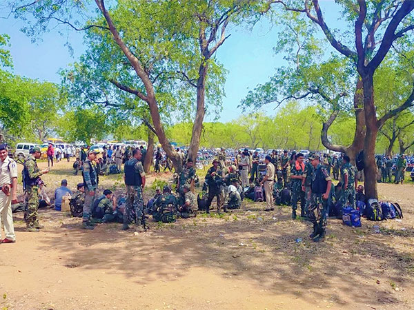 Paramilitary personnel take rest before leaving for polling booths for second phase of Lok Sabha polls on April 25. (Photo/ANI)