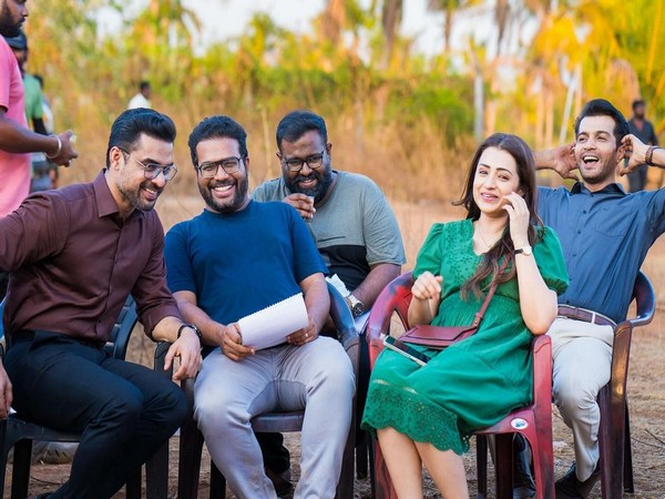 Tovino Thomas and Trisha Krishnan with others (image source: Instagram/akhilpaul_)