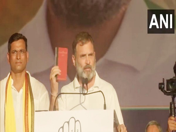 Congress leader Rahul Gandhi holding a  copy of the Consitutuion (Photo/ANI)