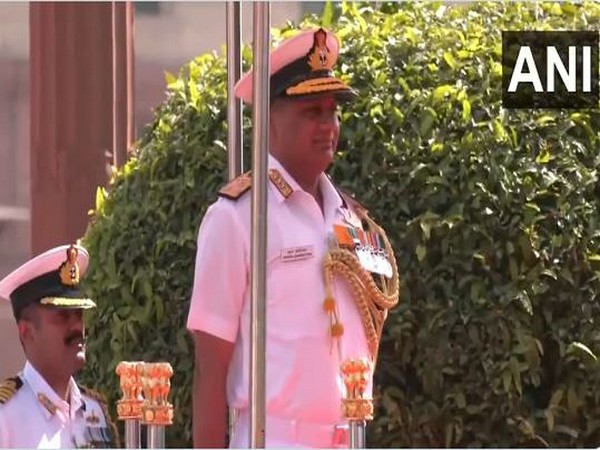 Vice Admiral Krishna Swaminathan receiving the Guard of Honour at the South Block in Delhi on Wednesday. (Photo/ANI)