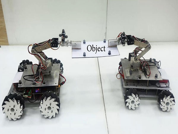 Two different types of robots cooperating to perform a task (Photo- IIT, Bombay)