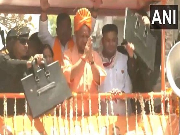 Uttar Pradesh Chief Minister Yogi Adityanath during a roadshow in Mainpuri (Photo/ANI)