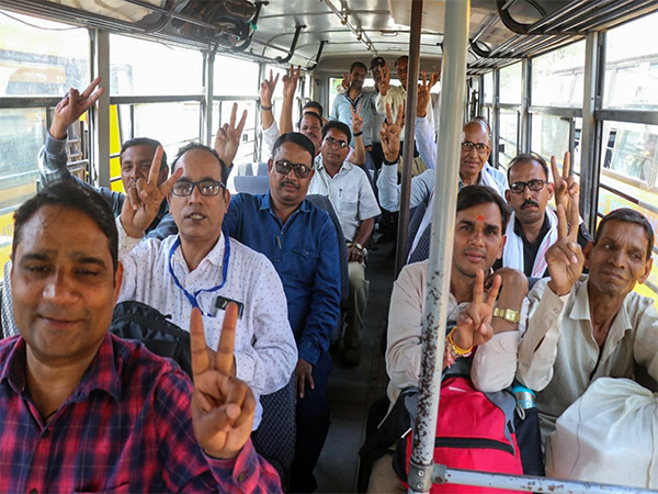 Polling officials leave for poll duty for 3rd phase of Lok Sabha polls on Monday. (Photo/ANI)