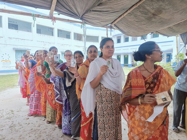People stand in queue to vote in West Bengal's Murshidabad. (Photo/ANI)