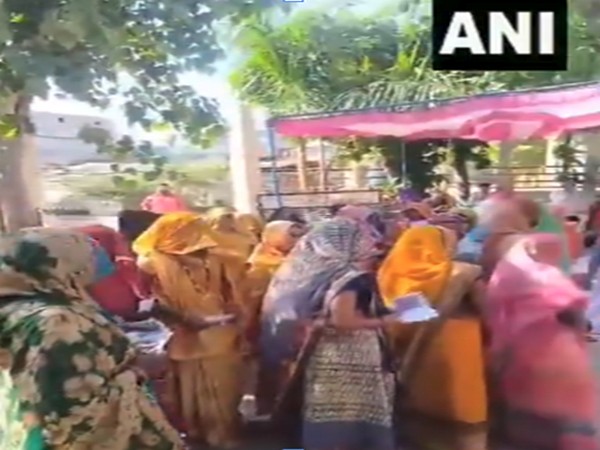 Women standing in queue to cast vote outside polling booth in Vidisha parliamentary seat (Photo/ANI)