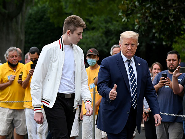 Former US President Donald Trump with his youngest son Barron Trump (Photo credit: Reuters)