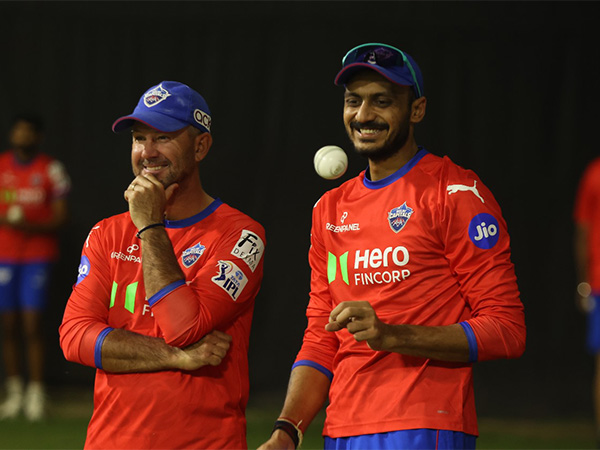 Axar Patel with Delhi Capitals head coach Ricky Ponting during practice session (Image: DC media)